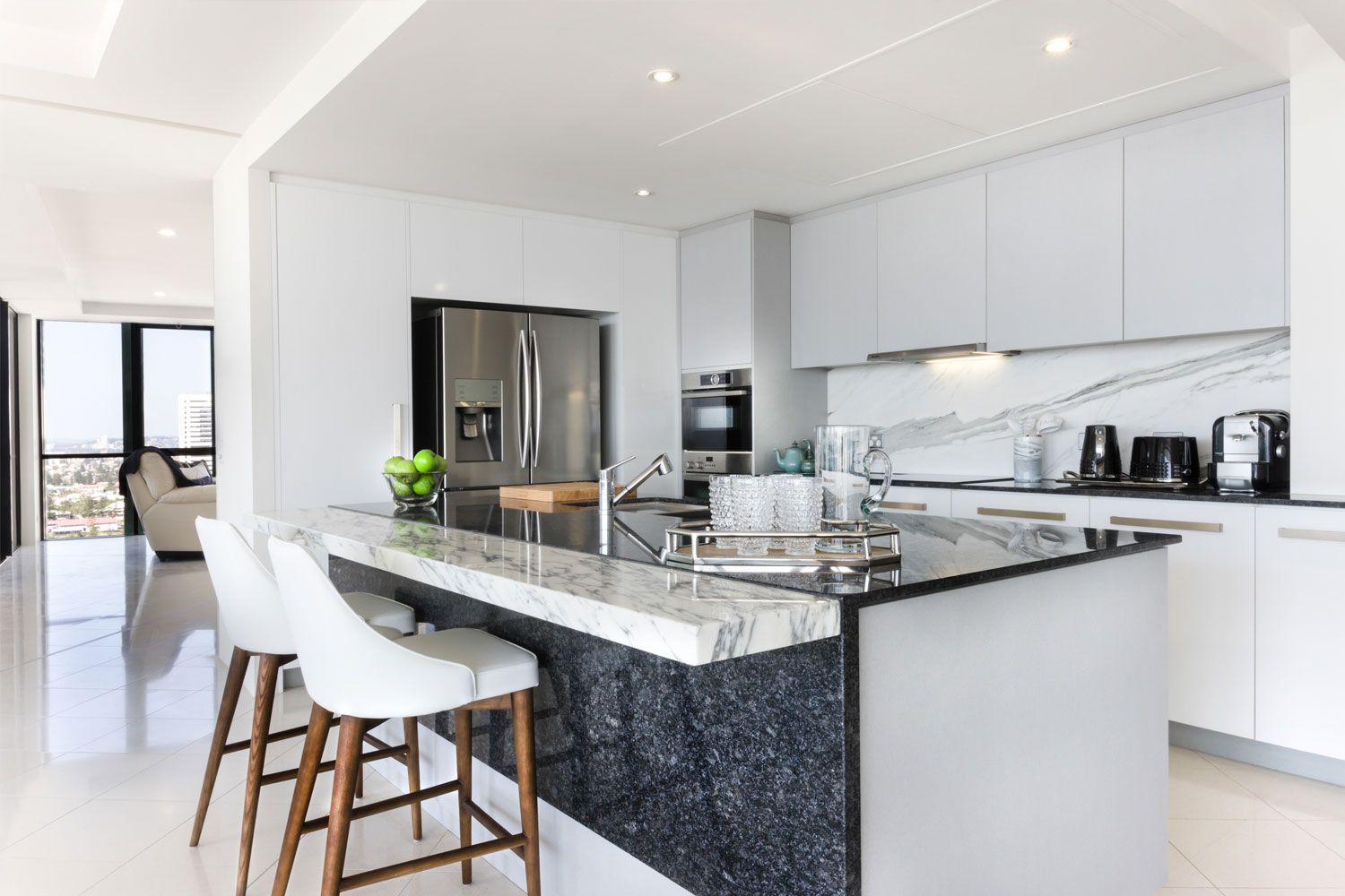 Modern white fitted kitchen with island installed in Droitwich